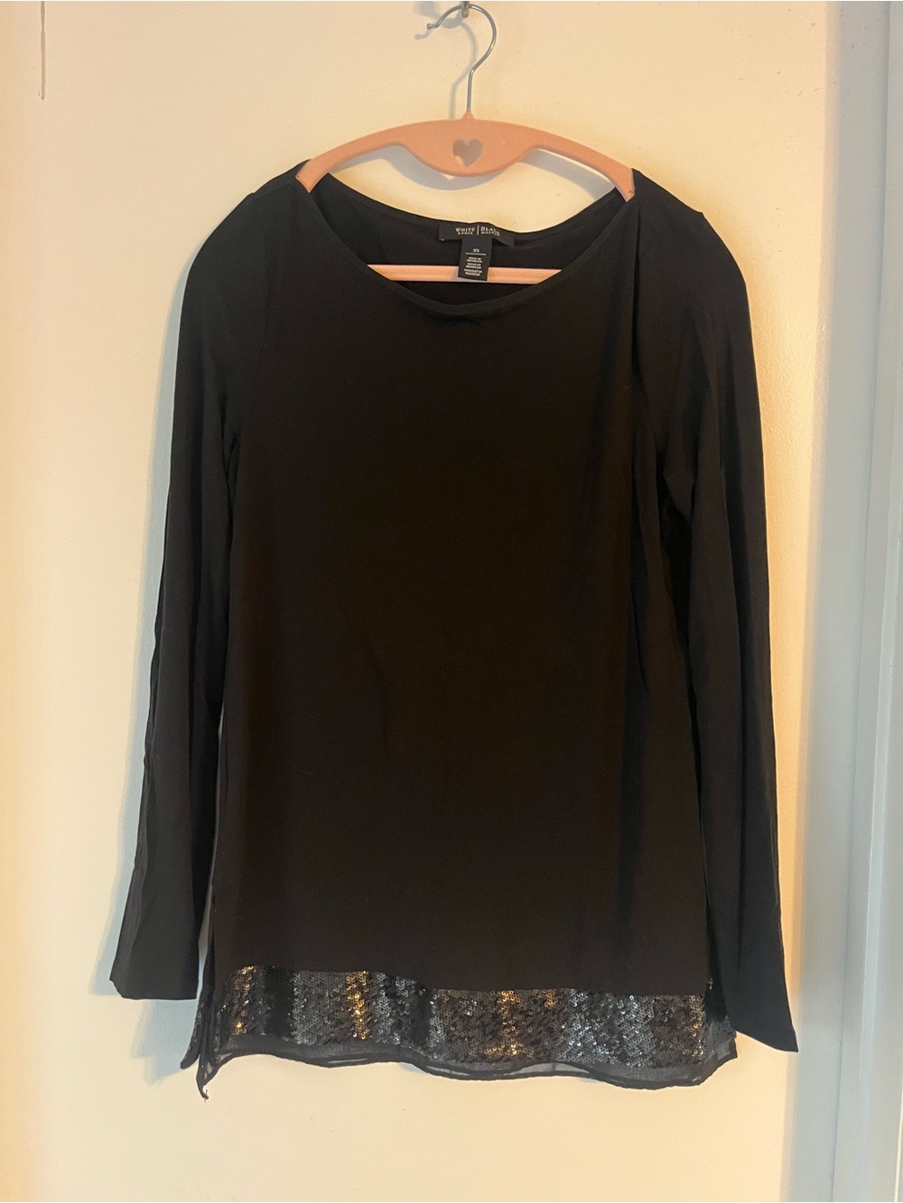 White House Black Market:  Black Long-Sleeve Top with Sequin Hem Trim
